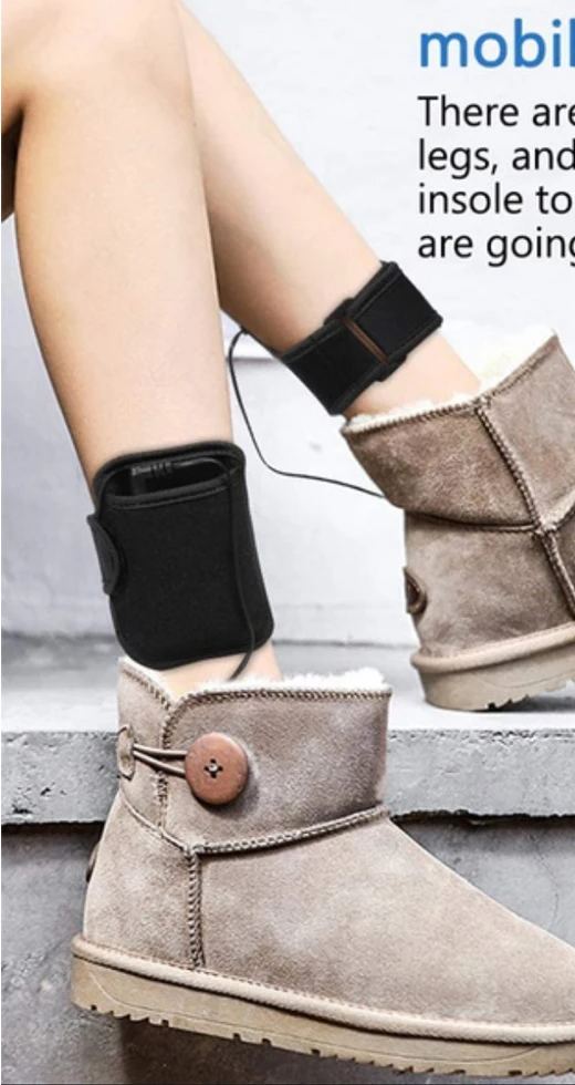 Heated insole battery holder strapped to an ankle above a suede boot